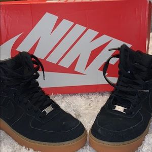 Black suede Nike shoes